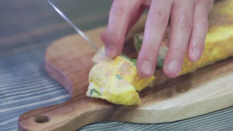 Fresh Rolled Omelette 01- Slicing on Wooden Board Stock Footage 342330875