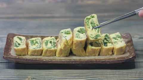 Fresh Rolled Omelette 03 - Picking Up with Chopsticks Stock Footage 342332154
