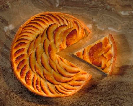 FRESH ROUND APPLE PIE WITH TRIANGULAR SLICE CUT OUT Stock Photos