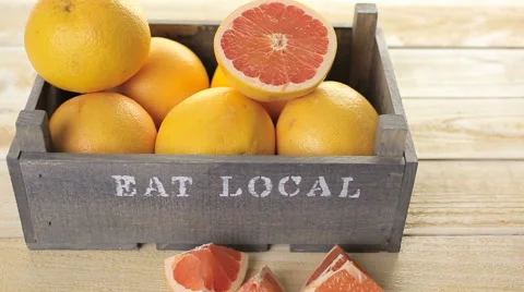 Fresh ruby red grapefruits in wood crate. Stock Footage 62816977