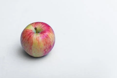 Fresh rustic apple on a white background Stock Photos