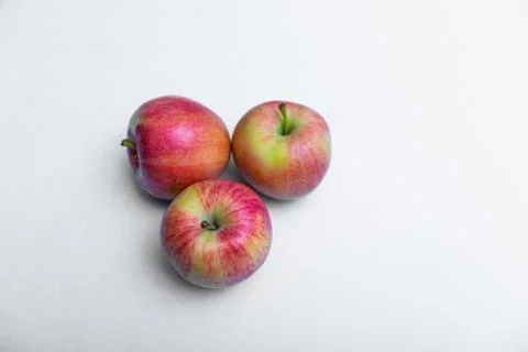 Fresh rustic apple on a white background Stock Photos