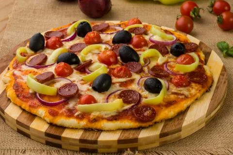 Fresh rustic pizza Stock Photos