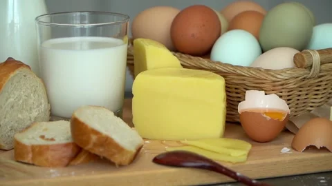 Fresh rustic products milk, bread, eggs, butter, cheese, olive oil. Stock Footage 160668972