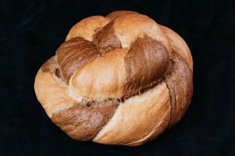 Fresh rye bread or whole grain bread. Isolated object on black background Stock Photos