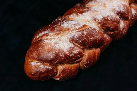 Fresh rye bread or whole grain bread. Isolated object on black background Stock Photos