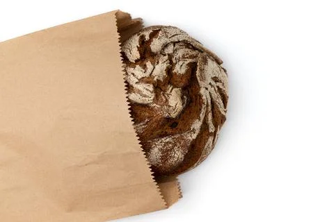 Fresh rye bread in paper bag isolated on white background Stock Photos