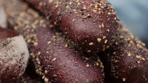 Fresh rye brown bread close-up. Artisan bread is making by skill bakers using Stock Footage 268035223