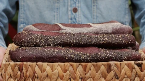 Fresh rye brown bread close-up. Artisan bread is making by skill bakers using Stock Footage 271662484