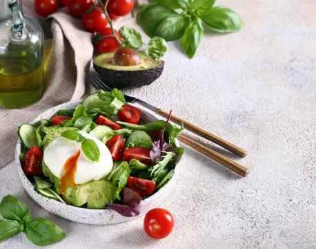 Fresh salad with avocado and vegetables healthy food Stock Photos