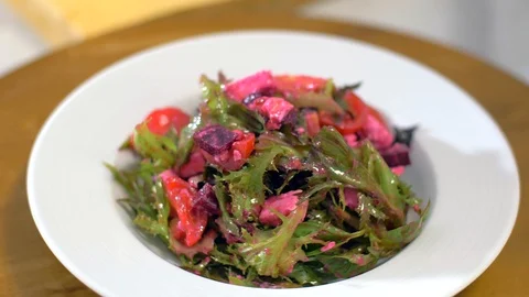 The fresh salad with beets rotates in a circle. Very appetizing Stock Footage 111270839