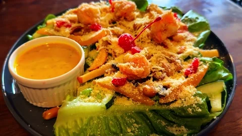 Fresh salad with dressing on plate Stock Footage 339735328