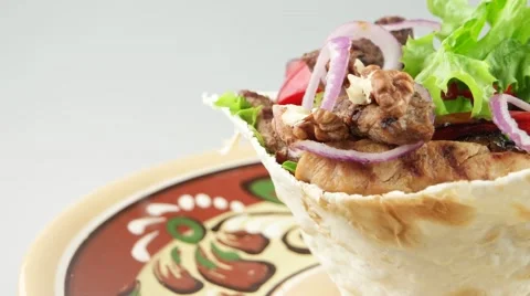 Fresh salad in the pita bread (Eastern European cuisine) Stock Footage 54998752