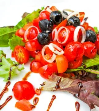 Fresh salad with tomatoes Stock Photos