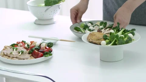 Fresh Salad on White Table in Warm Morning Light 動画素材 334280491