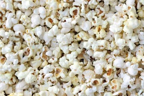 Fresh salted popcorn as a texture background. Texture Salted Sweet Corn Stock Photos