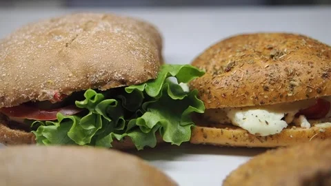 Fresh sandwich making in a busy kitchen Stock Footage 339317098