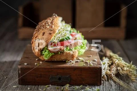 Fresh sandwich with roasted chicken, lettuce and tomato Stock Photos