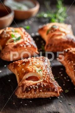 Fresh sausage roll as a snack for breakfast Stock Photos
