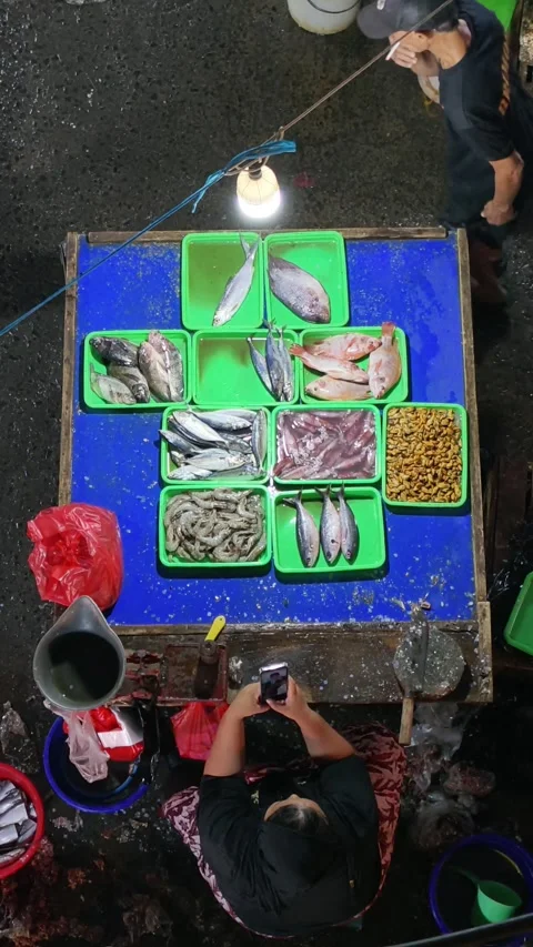 Fresh Seafood and Local Commerce at the Busy Pasar Minggu Traditional Market Stock Footage 340009702