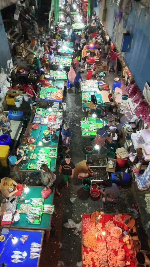 Fresh Seafood and Local Commerce at the Busy Pasar Minggu Traditional Market Stock Footage 340009947