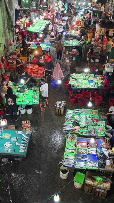 Fresh Seafood and Local Commerce at the Busy Pasar Minggu Traditional Market Stock Footage 340009990