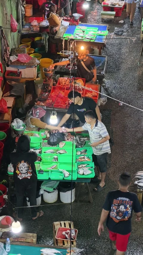 Fresh Seafood and Local Commerce at the Busy Pasar Minggu Traditional Market Stock Footage 340010404