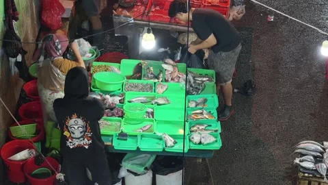 Fresh Seafood and Local Commerce at the Busy Pasar Minggu Traditional Market Stock Footage 340010408