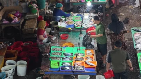 Fresh Seafood and Local Commerce at the Busy Pasar Minggu Traditional Market Stock Footage 340011232
