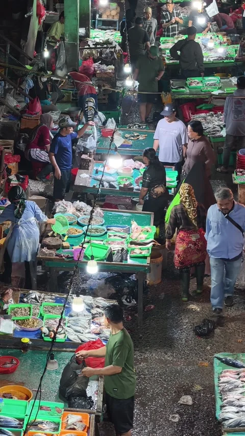 Fresh Seafood and Local Commerce at the Busy Pasar Minggu Traditional Market Stock Footage 340011495