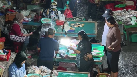 Fresh Seafood and Local Commerce at the Busy Pasar Minggu Traditional Market Stock Footage 340011657