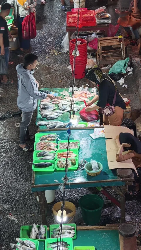 Fresh Seafood and Local Commerce at the Busy Pasar Minggu Traditional Market Stock Footage 340012060