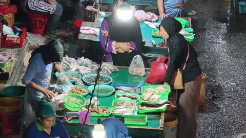 Fresh Seafood and Local Commerce at the Busy Pasar Minggu Traditional Market Stock Footage 340012857