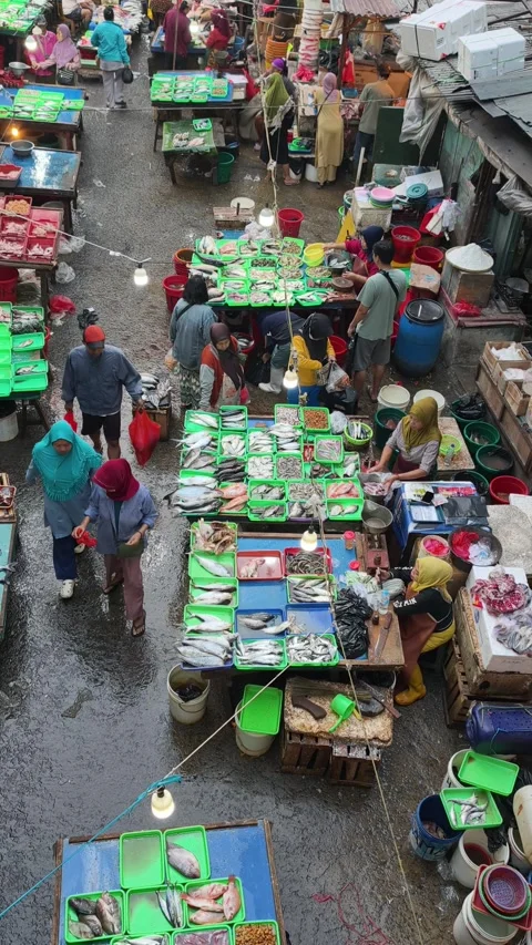 Fresh Seafood and Local Commerce at the Busy Pasar Minggu Traditional Market Stock Footage 340013388