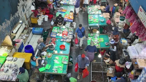 Fresh Seafood and Local Commerce at the Busy Pasar Minggu Traditional Market Stock Footage 340013585