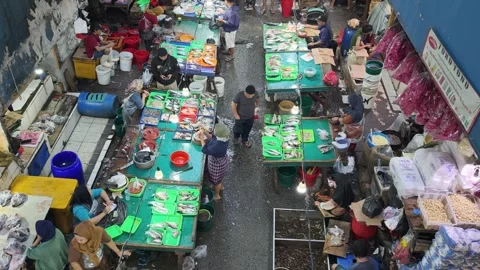 Fresh Seafood and Local Commerce at the Busy Pasar Minggu Traditional Market Stock Footage 340013627