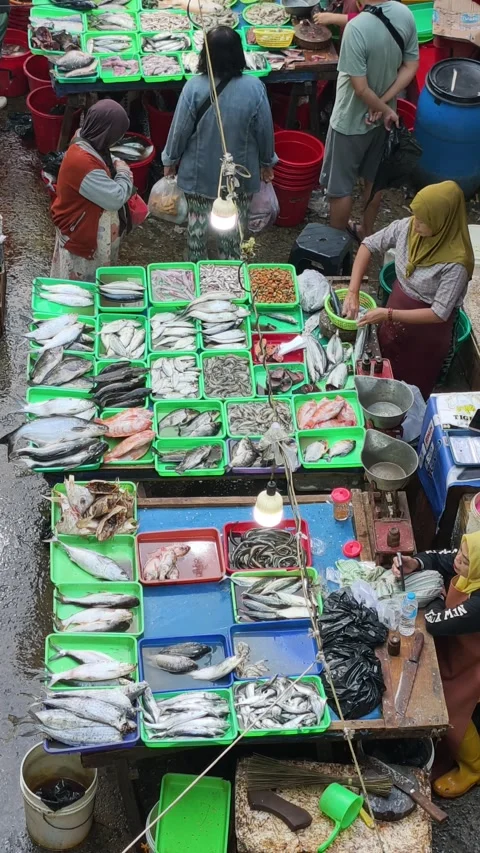 Fresh Seafood and Local Commerce at the Busy Pasar Minggu Traditional Market Stock Footage 340013772
