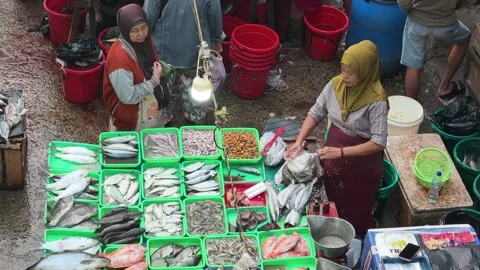 Fresh Seafood and Local Commerce at the Busy Pasar Minggu Traditional Market Stock Footage 340013856