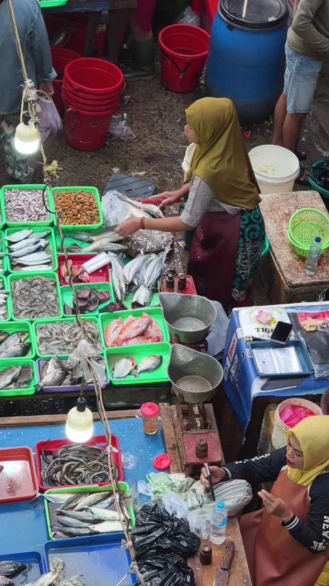 Fresh Seafood and Local Commerce at the Busy Pasar Minggu Traditional Market Stock Footage 340013874