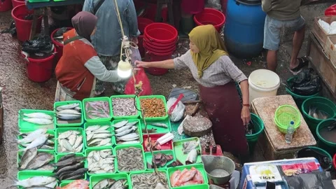 Fresh Seafood and Local Commerce at the Busy Pasar Minggu Traditional Market Stock Footage 340013951