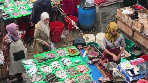 Fresh Seafood and Local Commerce at the Busy Pasar Minggu Traditional Market Stock Footage 340015354