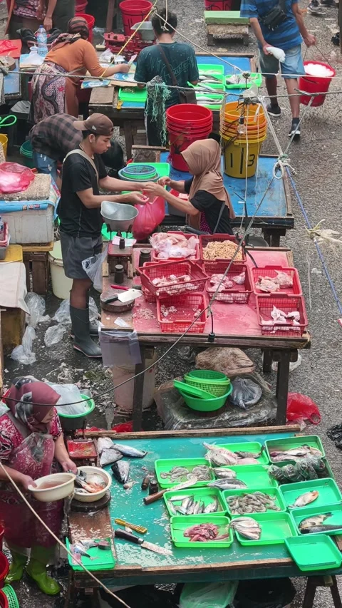 Fresh Seafood and Local Commerce at the Busy Pasar Minggu Traditional Market Stock Footage 340015583