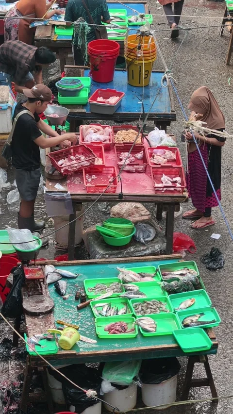 Fresh Seafood and Local Commerce at the Busy Pasar Minggu Traditional Market Stock Footage 340015682