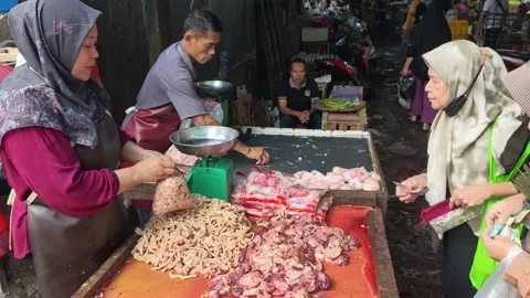 Fresh Seafood and Local Commerce at the Busy Pasar Minggu Traditional Market Stock Footage 340015735
