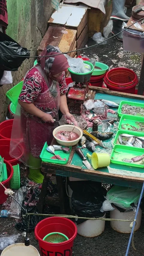 Fresh Seafood and Local Commerce at the Busy Pasar Minggu Traditional Market Stock Footage 340016457