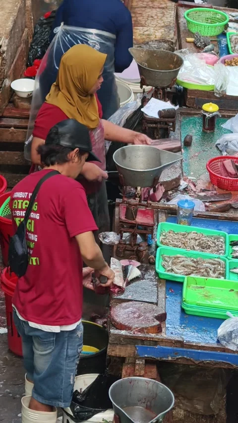 Fresh Seafood and Local Commerce at the Busy Pasar Minggu Traditional Market Stock Footage 340016874