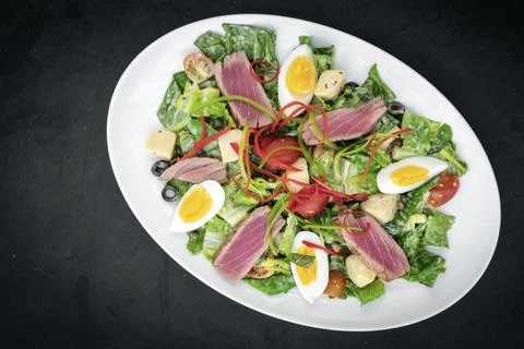 Fresh seared raw tuna mixed vegetable salad with mustard sauce Stock Photos