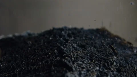 Fresh slice of black bread is broken open in slow motion at 120 fps Stock Footage 101729119