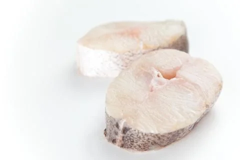 Fresh slice of hake Stock Photos