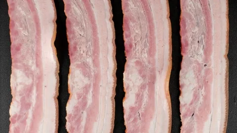 Fresh sliced bacon top view, slider shot Stock-Footage 264960643